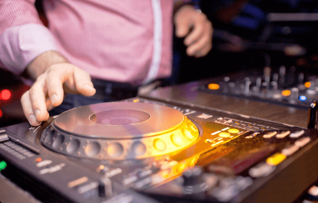 The Role of a DJ in Creating the Perfect Event Atmosphere